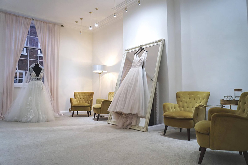 Interior of Along Came Eve with wedding dresses
